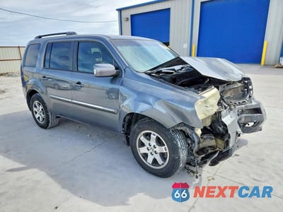 Czwarte zdjęcie samochodu z boku: 2011 HONDA PILOT TOURING VIN:5FNYF4H92BB103825 - miniatura