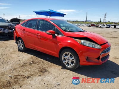 Czwarte zdjęcie samochodu z boku: 2014 FORD FIESTA SE VIN:3FADP4BJ9EM217129 - miniatura