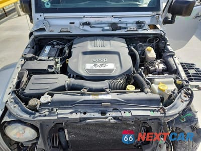 Zdjęcie 12 z 12 samochodu: 2012 JEEP WRANGLER UNLIMITED SAHARA VIN:1C4BJWEG6CL188752 - miniatura