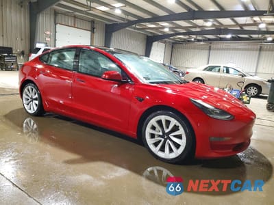 Czwarte zdjęcie samochodu z boku: 2023 TESLA MODEL 3 VIN:5YJ3E1EA7PF433669 - miniatura