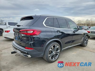 Trzecie zdjęcie samochodu z tyłu: 2021 BMW X5 XDRIVE45E VIN:5UXTA6C05M9F32422 - miniatura