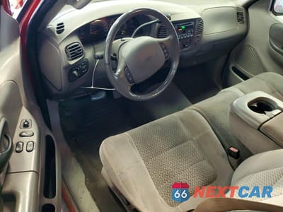 Zdjęcie 8 z 12 samochodu: 2001 FORD F150 VIN:1FTRF18W21NA48964 - miniatura