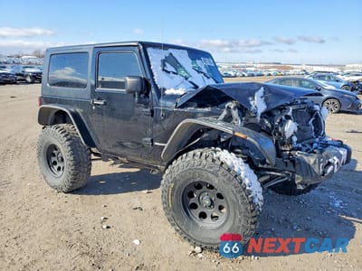 Czwarte zdjęcie samochodu z boku: 2010 JEEP WRANGLER SPORT VIN:1J4AA2D11AL203487 - miniatura