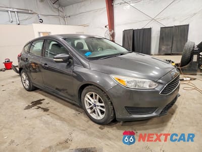Czwarte zdjęcie samochodu z boku: 2017 FORD FOCUS SE VIN:1FADP3K24HL311217 - miniatura