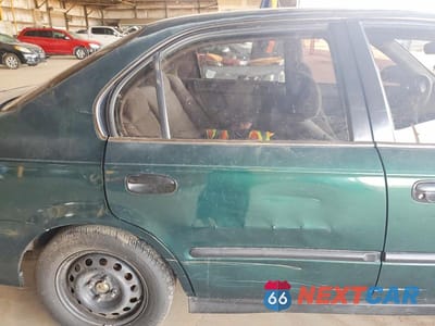 Zdjęcie 10 z 12 samochodu: 2000 HONDA CIVIC LX VIN:1HGEJ6677YL047435 - miniatura