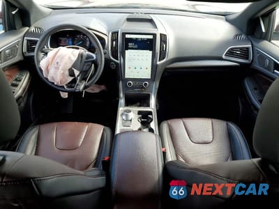 Zdjęcie 8 z 14 samochodu: 2021 FORD EDGE TITANIUM VIN:2FMPK3K99MBA59439 - miniatura
