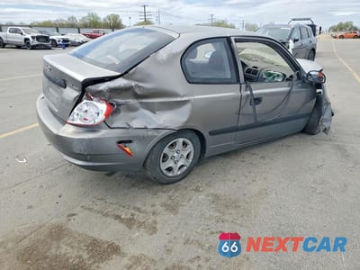 Trzecie zdjęcie samochodu z tyłu: 2004 HYUNDAI ACCENT BASE VIN:KMHCF35C54U299849 - miniatura