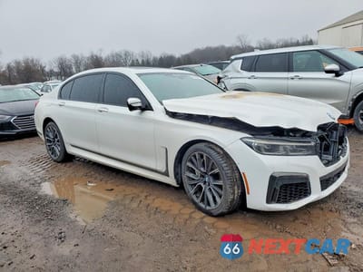 Czwarte zdjęcie samochodu z boku: 2022 BMW 750 XI VIN:WBA7U2C01NCH00982 - miniatura