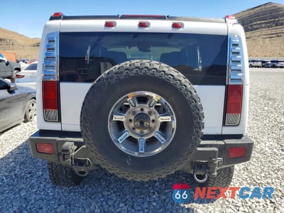 Zdjęcie 6 z 13 samochodu: 2006 HUMMER H2 VIN:5GRGN23U46H107619 - miniatura