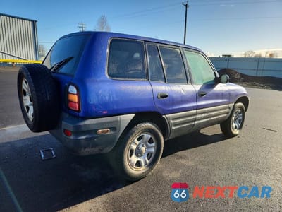 Trzecie zdjęcie samochodu z tyłu: 1999 TOYOTA RAV4 BASE VIN:JT3HP10V1X7128527 - miniatura