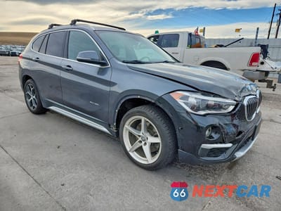 Czwarte zdjęcie samochodu z boku: 2017 BMW X1 XDRIVE28I VIN:WBXHT3C38H5F69085 - miniatura