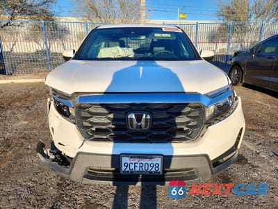 Piąte zdjęcie samochodu w środku: 2022 HONDA PASSPORT EXL VIN:5FNYF7H50NB005542 - miniatura