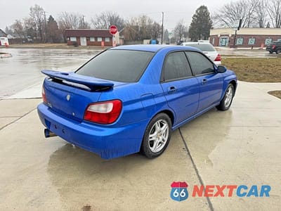 Czwarte zdjęcie samochodu z boku: 2002 SUBARU IMPREZA WRX VIN:JF1GD29692G520719 - miniatura