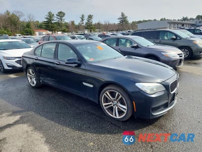 Czwarte zdjęcie samochodu z boku: 2014 BMW 750 VIN:WBAYB6C55ED224188 - miniatura