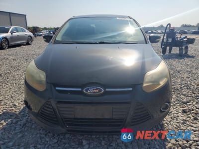 Piąte zdjęcie samochodu w środku: 2013 FORD FOCUS TITANIUM VIN:1FADP3N24DL187309 - miniatura