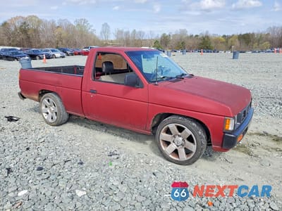 Czwarte zdjęcie samochodu z boku: 1994 NISSAN TRUCK BASE VIN:1N6SD11SXRC306828 - miniatura
