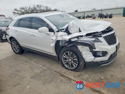 Czwarte zdjęcie samochodu z boku: 2021 CADILLAC XT5 PREMIUM LUXURY VIN:1GYKNCR47MZ115806 - miniatura