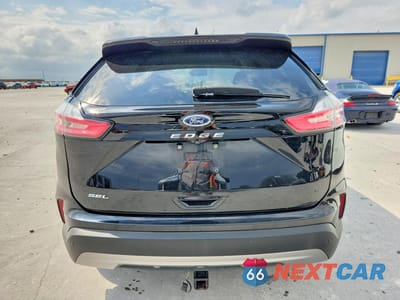Zdjęcie 6 z 12 samochodu: 2021 FORD EDGE SEL VIN:2FMPK3J96MBA26397 - miniatura