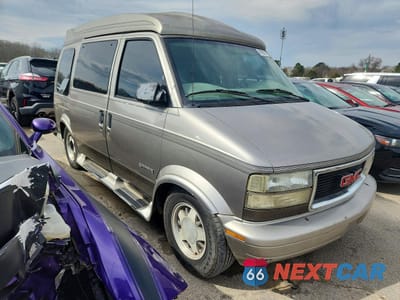 Czwarte zdjęcie samochodu z boku: 2001 GMC SAFARI VIN:1GDDM19W31B521640 - miniatura