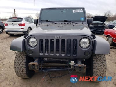 Piąte zdjęcie samochodu w środku: 2017 JEEP WRANGLER UNLIMITED SPORT VIN:1C4BJWDG2HL563397 - miniatura