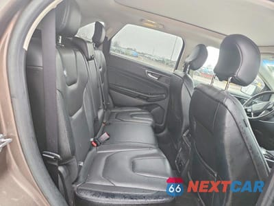 Zdjęcie 11 z 12 samochodu: 2019 FORD EDGE TITANIUM VIN:2FMPK4K96KBB74972 - miniatura