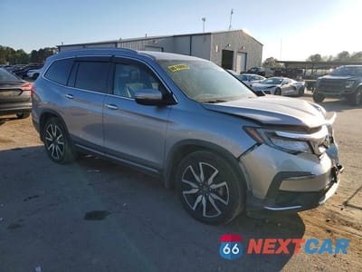 Czwarte zdjęcie samochodu z boku: 2020 HONDA PILOT TOURING VIN:5FNYF5H68LB019425 - miniatura