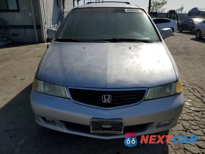 Piąte zdjęcie samochodu w środku: 2001 HONDA ODYSSEY EX VIN:2HKRL18601H554611 - miniatura