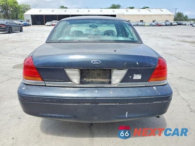 Zdjęcie 6 z 12 samochodu: 2000 FORD CROWN VICTORIA LX VIN:2FAFP74W6YX147875 - miniatura
