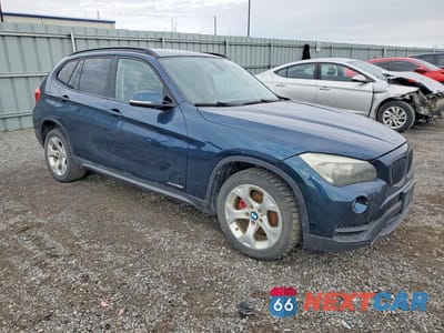 Czwarte zdjęcie samochodu z boku: 2013 BMW X1 XDRIVE28I VIN:WBAVL1C51DVR89457 - miniatura