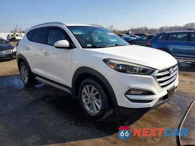 Czwarte zdjęcie samochodu z boku: 2017 HYUNDAI TUCSON SE VIN:KM8J3CA46HU403981 - miniatura