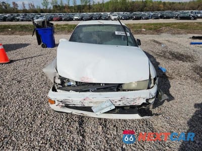 Piąte zdjęcie samochodu w środku: 1995 TOYOTA COROLLA DX VIN:1NXAE09B7SZ316433 - miniatura