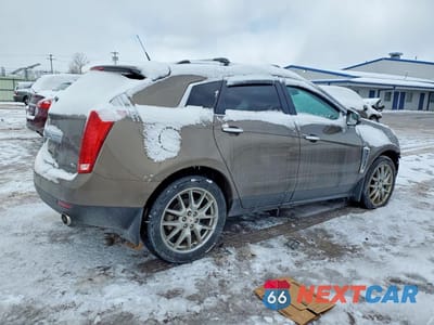 Trzecie zdjęcie samochodu z tyłu: 2014 CADILLAC SRX PREMIUM COLLECTION VIN:3GYFNGE38ES565355 - miniatura