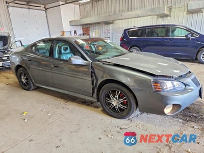 Czwarte zdjęcie samochodu z boku: 2004 PONTIAC GRAND PRIX GTP VIN:2G2WR524341359032 - miniatura