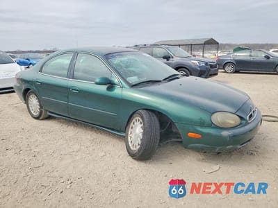 Czwarte zdjęcie samochodu z boku: 1999 MERCURY SABLE GS VIN:1MEFM50U4XG619831 - miniatura