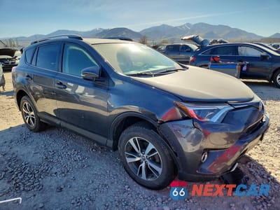 Czwarte zdjęcie samochodu z boku: 2016 TOYOTA RAV4 XLE VIN:JTMRFREVXGJ077882 - miniatura