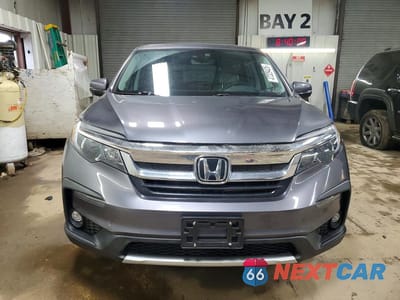 Piąte zdjęcie samochodu w środku: 2021 HONDA PILOT EXL VIN:5FNYF6H5XMB066664 - miniatura