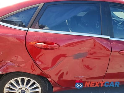 Zdjęcie 10 z 13 samochodu: 2014 FORD FIESTA TITANIUM VIN:3FADP4CJ9EM150806 - miniatura