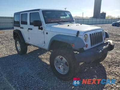 Czwarte zdjęcie samochodu z boku: 2012 JEEP WRANGLER UNLIMITED SAHARA VIN:1C4BJWEG6CL205775 - miniatura