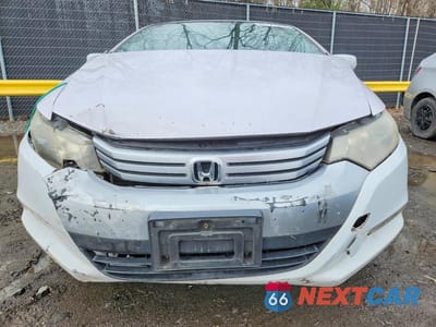 Piąte zdjęcie samochodu w środku: 2010 HONDA INSIGHT EX VIN:JHMZE2H74AS032587 - miniatura
