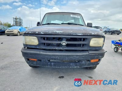 Piąte zdjęcie samochodu w środku: 1994 MAZDA B3000 CAB PLUS VIN:4F4CR16U1RTM03443 - miniatura