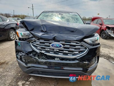 Piąte zdjęcie samochodu w środku: 2023 FORD EDGE TITANIUM VIN:2FMPK4K95PBA19658 - miniatura