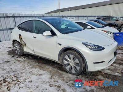 Czwarte zdjęcie samochodu z boku: 2022 TESLA MODEL Y VIN:7SAYGAEE6NF518246 - miniatura