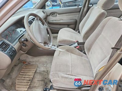 Zdjęcie 7 z 11 samochodu: 1996 TOYOTA COROLLA DX VIN:2T1BB02E0TC147585 - miniatura