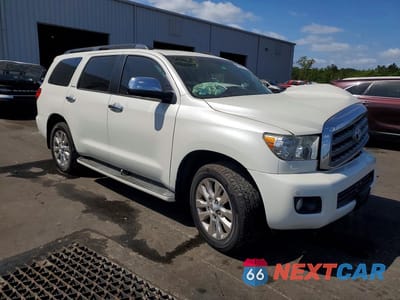 Czwarte zdjęcie samochodu z boku: 2014 TOYOTA SEQUOIA PLATINUM VIN:5TDDW5G16ES105755 - miniatura