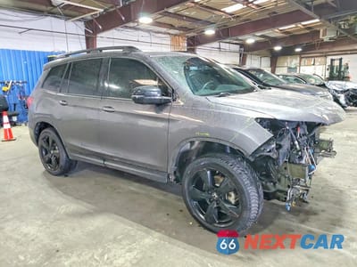 Czwarte zdjęcie samochodu z boku: 2021 HONDA PASSPORT ELITE VIN:5FNYF8H01MB036436 - miniatura