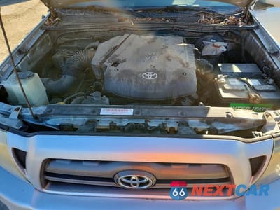 Zdjęcie 11 z 11 samochodu: 2009 TOYOTA TACOMA V6 VIN:3TMLU42N09M034709 - miniatura