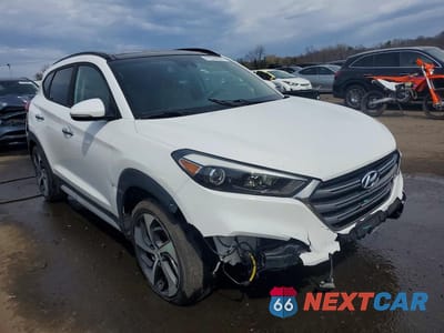Czwarte zdjęcie samochodu z boku: 2018 HYUNDAI TUCSON LIMITED VIN:KM8J3CA29JU834934 - miniatura