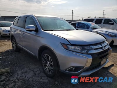 Czwarte zdjęcie samochodu z boku: 2016 MITSUBISHI OUTLANDER SE VIN:JA4AD3A33GZ006328 - miniatura