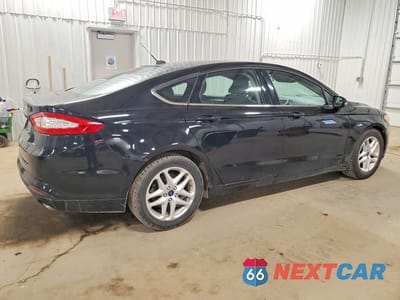 Trzecie zdjęcie samochodu z tyłu: 2016 FORD FUSION SE VIN:3FA6P0H72GR290751 - miniatura