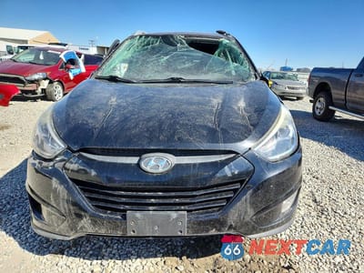 Piąte zdjęcie samochodu w środku: 2014 HYUNDAI TUCSON THE WALKING DEAD EDITION VIN:KM8JUCAG9EU941500 - miniatura